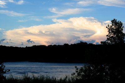 Early evening sun still hitting tops of clouds Coralville Iowa