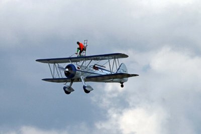 Dave Dacy  piloting the Super Sterman and Tony Kazian walking the wing