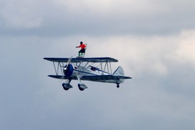 Dave Dacy  piloting the Super Sterman and Tony Kazian walking the wing