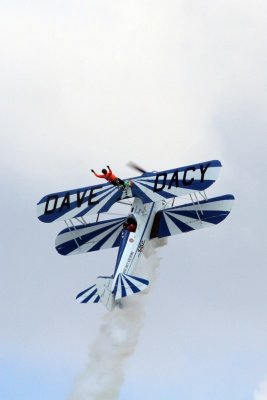Dave Dacy piloting the Super Sterman and Tony Kazian walking the wing