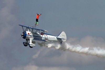 Dave Dacy piloting the Super Sterman and Tony Kazian walking the wing