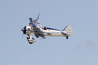 Dave Dacy piloting the Super Sterman and Tony Kazian walking the wing