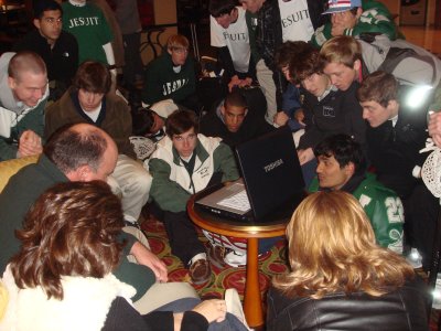 Listening to the Strake Jesuit basketball state semi-final over wifi in the hotel lobby.