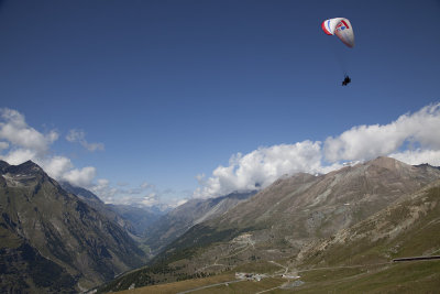 Mom paragliding above, in Zermatt.