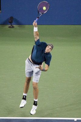 John Isner serving.