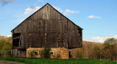 Barn sitting on a smaller first floor