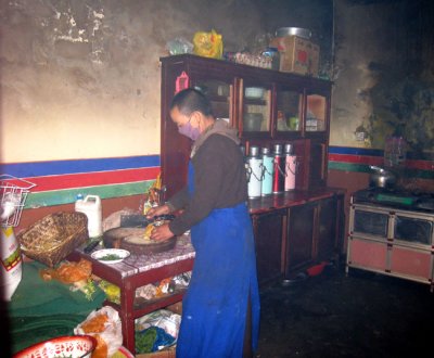 Buddhist nun preparing food