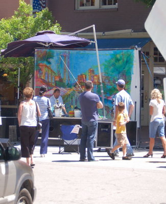 Dan Nelson creating a large painting