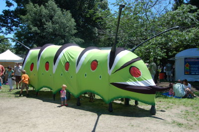 Giant interacitve caterpiller puppet created by Paperhand Puppet Intervention Co.