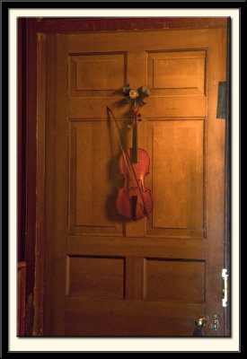 Trompe l'Oeil Violin and Bow Hanging on a door, c.1723