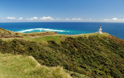 Arrowhead shaped surf marks the meeting of the Pacific Ocean and the Tazsman Sea, Cape Reinga