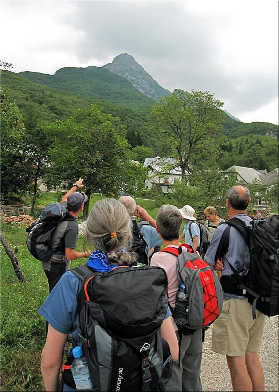 Our HF group leader, Mark, points to the summit of Svinjak.jpg