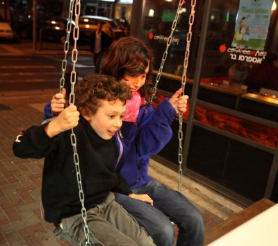 Swings in Front of the ice cream place