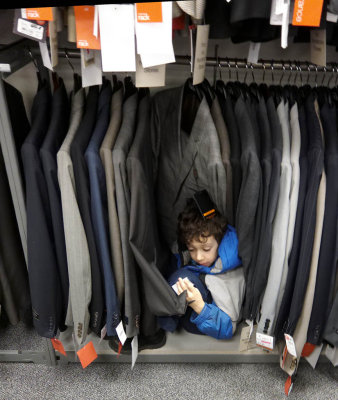 Isaac checking out the sale at the rack