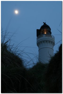 Misty moon and Lighthouse