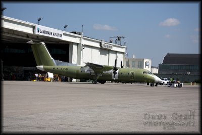 BIG plane being pulled out of a hanger