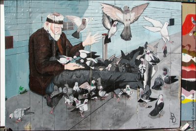 Clarion Alley mural of man feeding pigeons.jpg