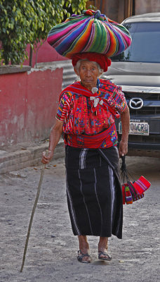 Woman Cane and Bundle