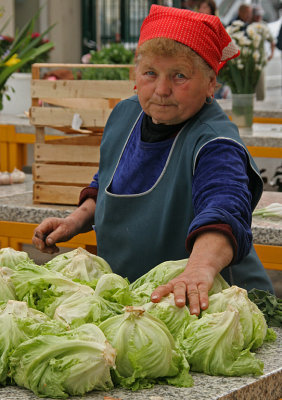 Woman Selling Lettuce