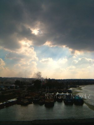 Storm over river Sava docks.