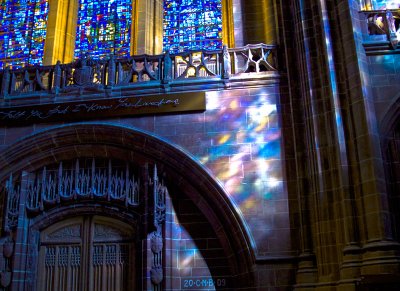 Stained glass reflections in Liverpool Cathedral under the West window and along side Tracey Emin's artwork