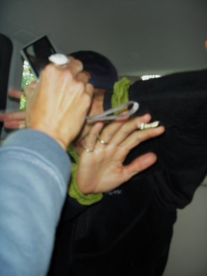punches the Paparazzi?  :)