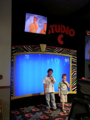 Evan and Silas mugging at ChuckECheese.JPG