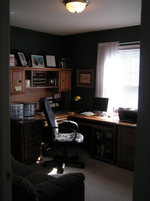 The classic style den with large closet can be used as a bedroom.jpg