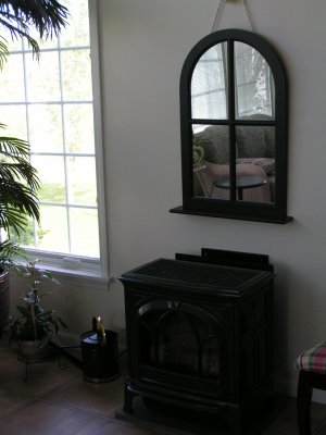 The porcelain fireplace is a cozy addition in the winter.jpg