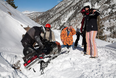 Trying to dig out the snowmobile