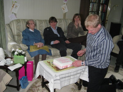 Gran, William, Angela and Tim cake cutting