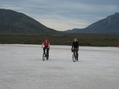 Two ladies on bikes on the runway