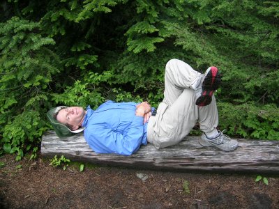 Jim relaxing on a log