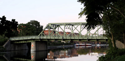 bridge with red boats