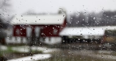 barn through a rainey window