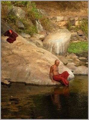 Monk Bathing Kalu Pokuna Sri Lanka