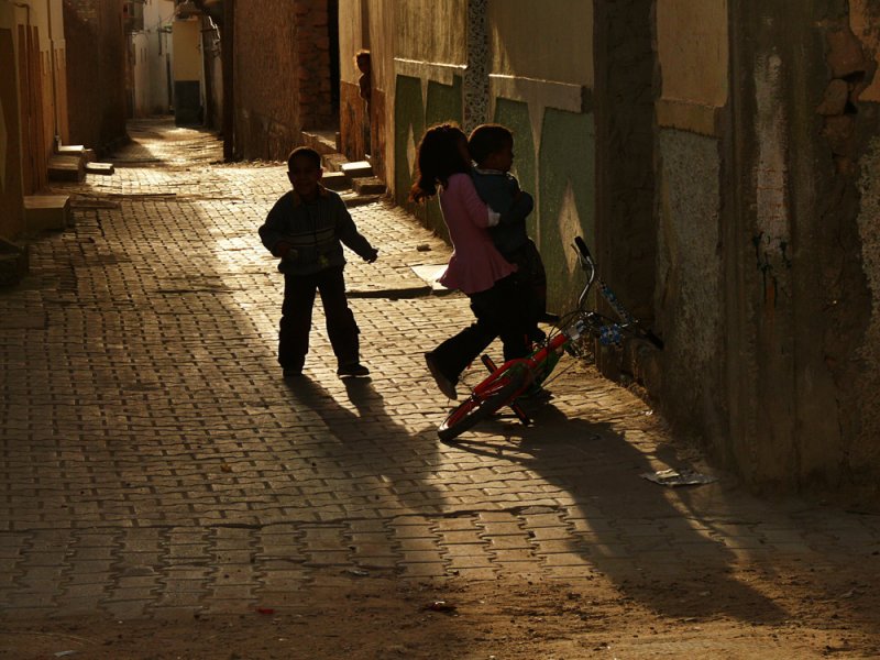 Minding little brother, Tozeur, Tunisia, 2008