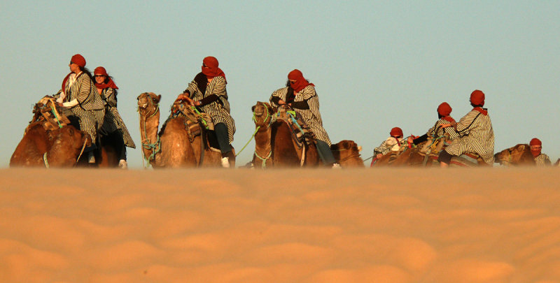Italian Berbers on camelback, Douze, Tunisia, 2008