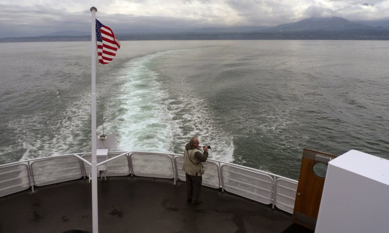 Photographer at sea, Port Angeles-Victoria Ferry, 2009