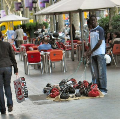 Illegal Street Peddler, in Barcelona - ready for Police raid.JPG