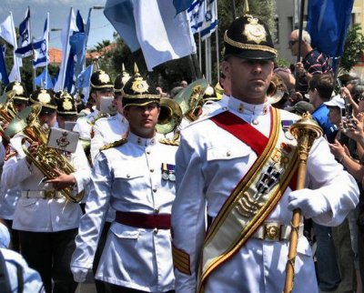 A condudtor  leading his military band .JPG
