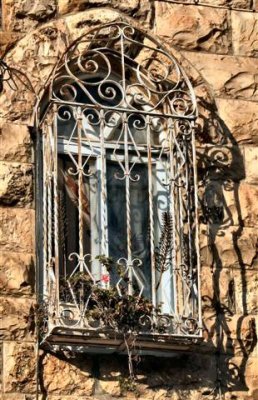 a secured window of a dwelling house, Ein Kerem.JPG