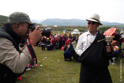 Arnel photographs a religious man