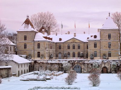 In the rosy light of dawn the cheeks of snow blush...