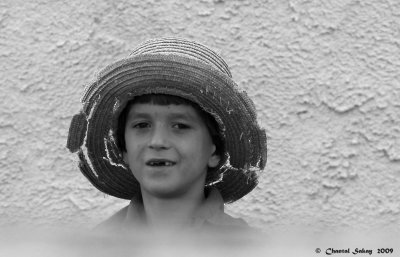 Young Amish Boy in Straw Hat