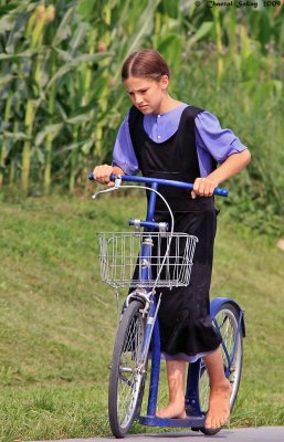 Young Amish Girl on Scooter