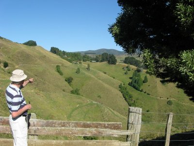 Paul pointing out Kairuru farmstead.JPG