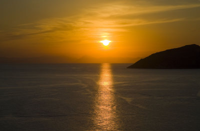 sunset over the aegean sea from cape sounion