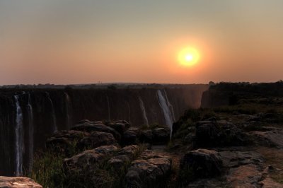 sunrise over victoria falls, zimbabwe