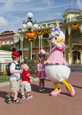 layne, elliott, lexi at the magic kingdom